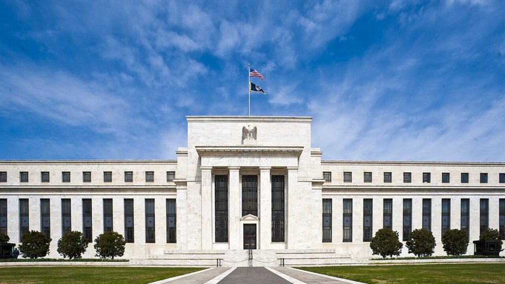 The Marriner S. Eccles Federal Reserve Board building in Washington DC under a blue sky