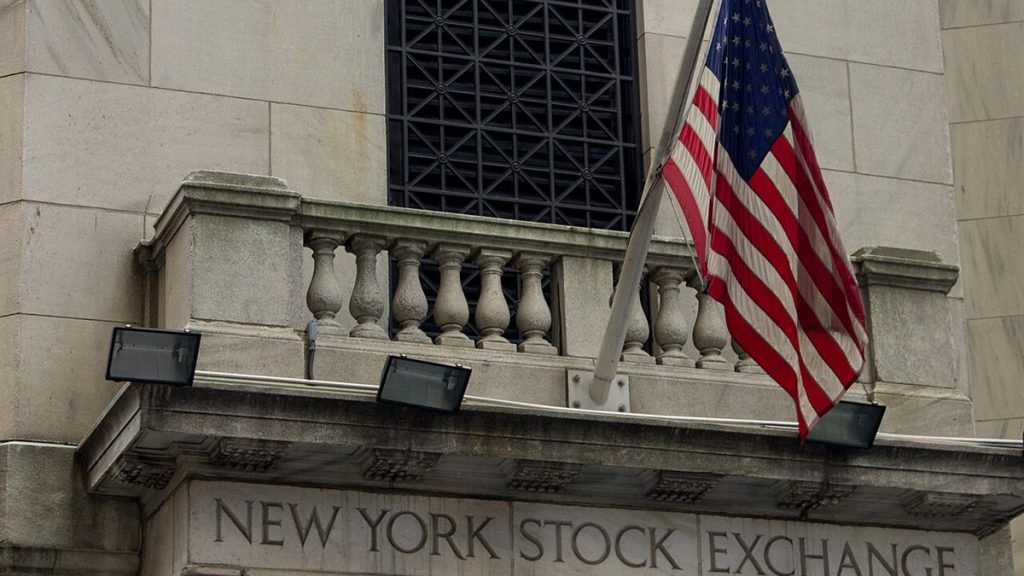 The New York Stock Exchange building with the United States flag